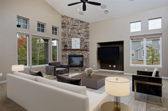 14022 E Fair Pl, Centennial, CO 80111 - carpeted living room with a ceiling fan, a brick fireplace, high vaulted ceiling, plenty of natural light, and baseboards