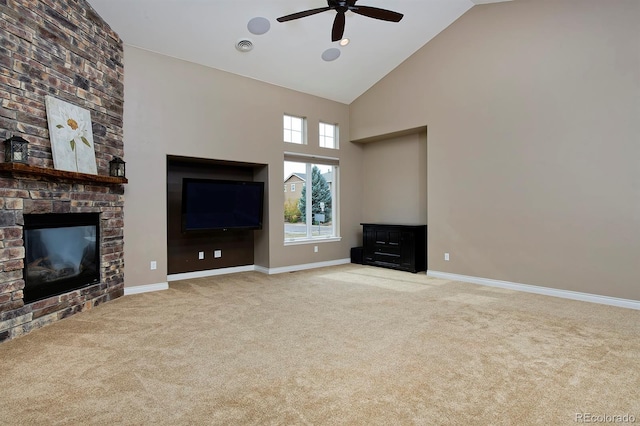 14022 E Fair Pl, Centennial, CO 80111 - unfurnished living room with high vaulted ceiling, a ceiling fan, carpet flooring, a large fireplace, and baseboards