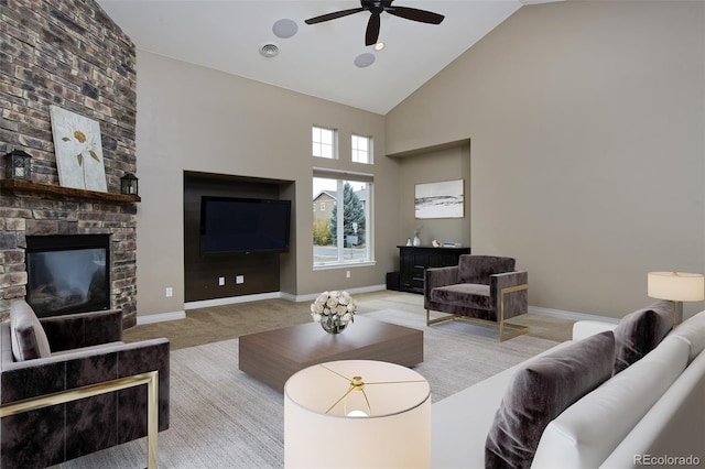 14022 E Fair Pl, Centennial, CO 80111 - living area with carpet flooring, high vaulted ceiling, ceiling fan, baseboards, and a fireplace