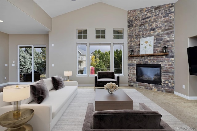 14022 E Fair Pl, Centennial, CO 80111 - carpeted living room featuring a fireplace, baseboards, and high vaulted ceiling