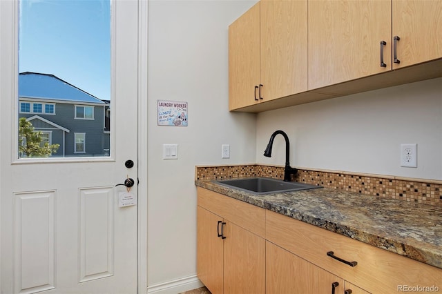 14022 E Fair Pl, Centennial, CO 80111 - laundry area featuring a sink and baseboards