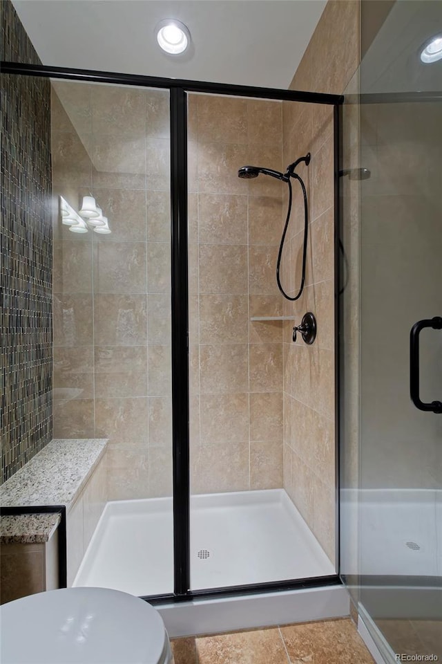 14022 E Fair Pl, Centennial, CO 80111 - bathroom with a shower stall and toilet