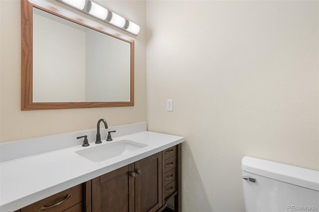 4589 S Sleepy Hollow Cir, Colorado Springs, CO 80917 - bathroom with vanity and toilet