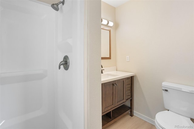 4589 S Sleepy Hollow Cir, Colorado Springs, CO 80917 - full bath featuring wood finished floors, vanity, and a shower