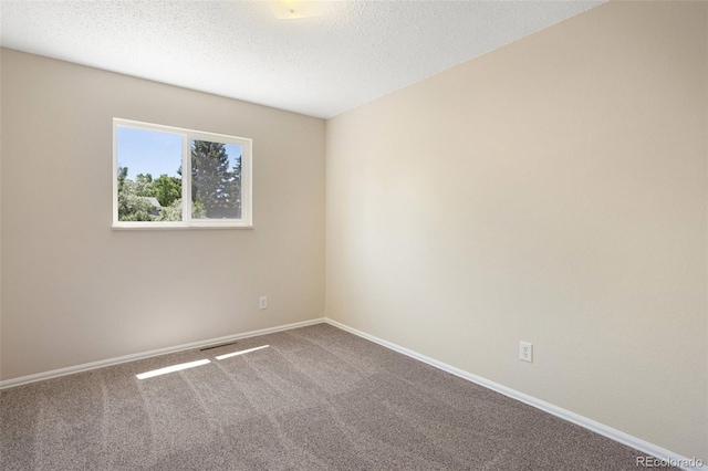 4589 S Sleepy Hollow Cir, Colorado Springs, CO 80917 - carpeted empty room featuring baseboards and a textured ceiling