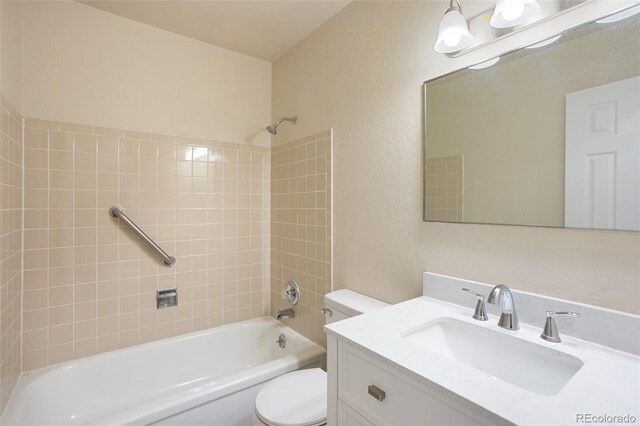 4589 S Sleepy Hollow Cir, Colorado Springs, CO 80917 - bathroom with washtub / shower combination, vanity, and a textured wall