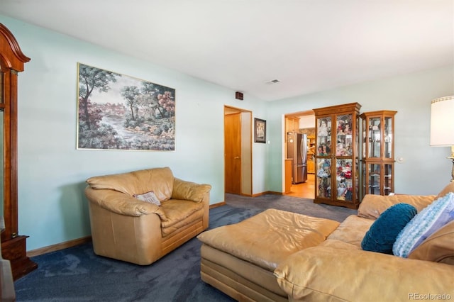 1922 Graves Ct, Northglenn, CO 80233 - carpeted living area featuring baseboards