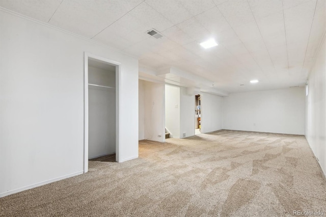 1922 Graves Ct, Northglenn, CO 80233 - finished below grade area with carpet flooring, stairs, and crown molding