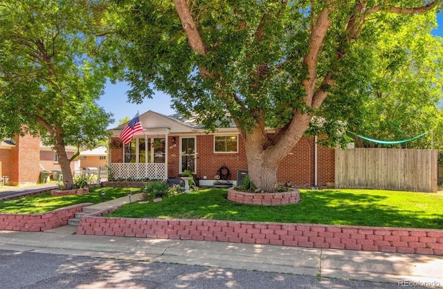 1922 Graves Ct, Northglenn, CO 80233 - view of front facade featuring brick siding