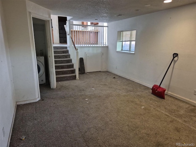 18249 E Mexico Pl, Aurora, CO 80017 - basement with carpet, stairs, washer / dryer, baseboards, and a textured ceiling