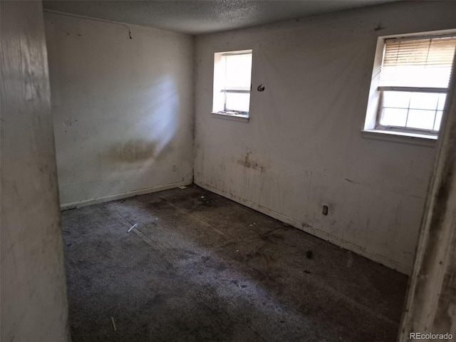 18249 E Mexico Pl, Aurora, CO 80017 - unfurnished room with a textured ceiling