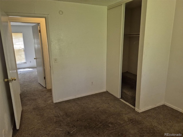 18249 E Mexico Pl, Aurora, CO 80017 - unfurnished bedroom with carpet floors, a closet, and baseboards