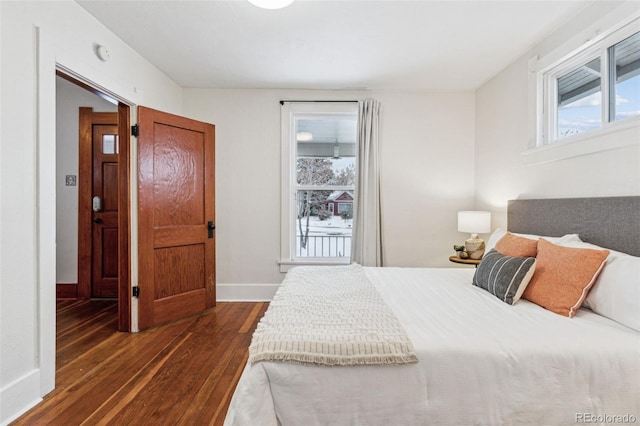 bedroom featuring dark wood-type flooring