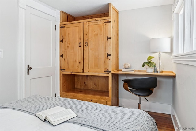 bedroom featuring dark hardwood / wood-style floors