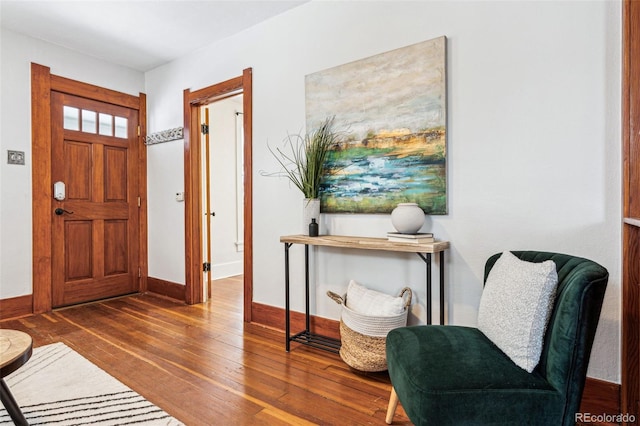 entryway with wood-type flooring