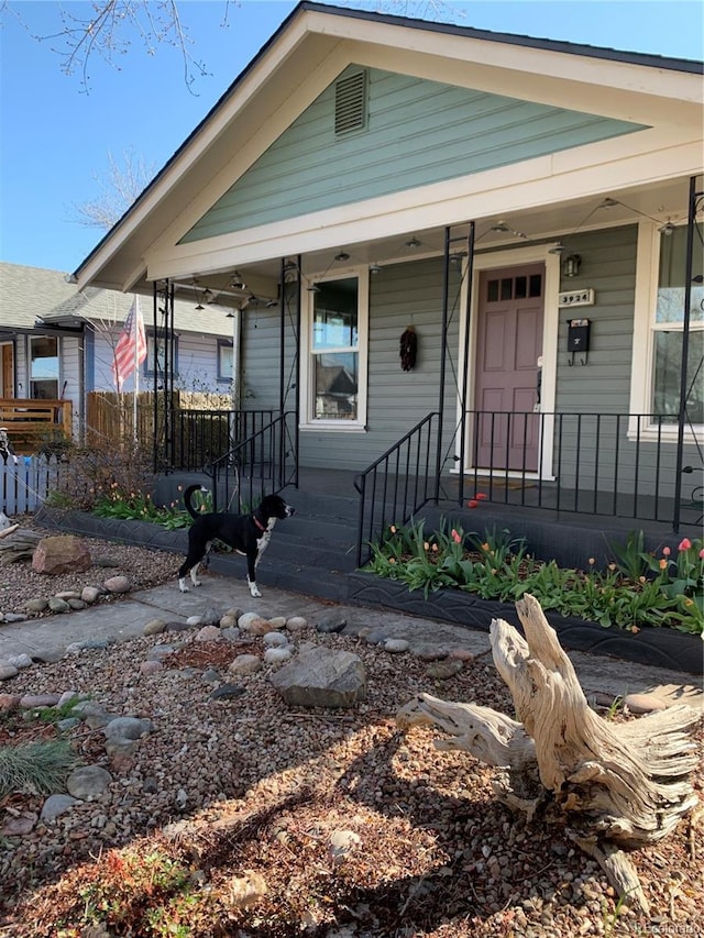 view of front of home featuring covered porch