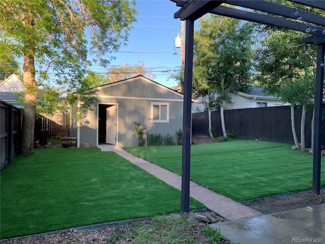 single story home with a pergola, an outbuilding, and a front yard