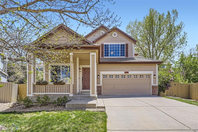 3744 Gypsum Ct, Superior, CO 80027 - view of front of property featuring fence, an attached garage, concrete driveway, and brick siding
