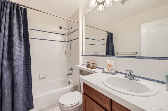 3744 Gypsum Ct, Superior, CO 80027 - bathroom featuring vanity, toilet, shower / bath combination with curtain, tasteful backsplash, and visible vents