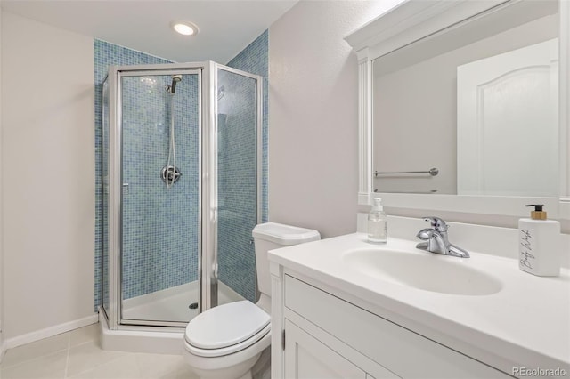 3744 Gypsum Ct, Superior, CO 80027 - full bathroom featuring toilet, a shower stall, tile patterned flooring, and vanity