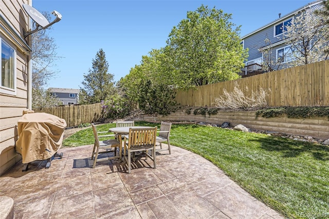 3744 Gypsum Ct, Superior, CO 80027 - view of patio featuring area for grilling, outdoor dining area, and a fenced backyard