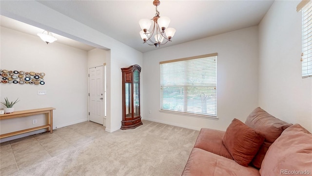 14230 Lakeview Ln, Broomfield, CO 80023 - living area featuring a chandelier, healthy amount of natural light, and light colored carpet
