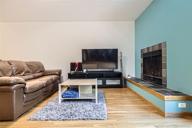 800 Illinois St Unit 1, Golden, CO 80401 - living area featuring wood finished floors and a tiled fireplace