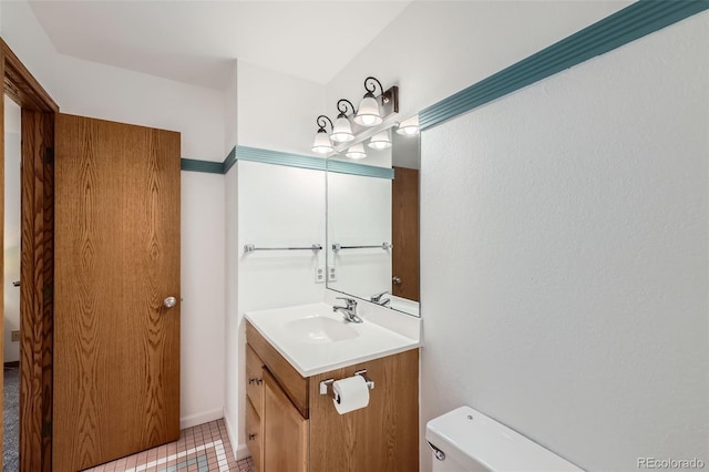 800 Illinois St Unit 1, Golden, CO 80401 - bathroom with toilet, vanity, and tile patterned flooring