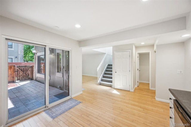 1219 S Yosemite Way Unit 63, Denver, CO 80247 - interior space featuring stairs, recessed lighting, baseboards, and light wood-type flooring