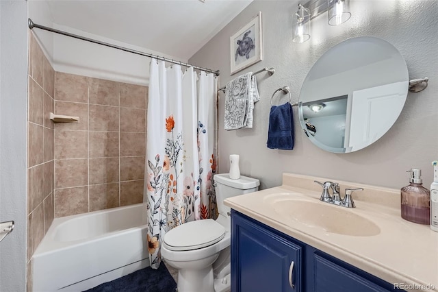 full bathroom with vanity, shower / bath combo, and toilet