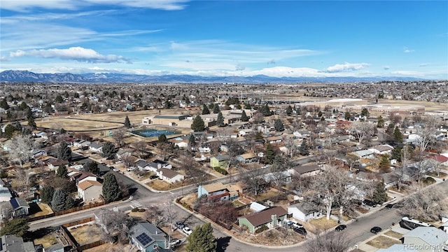 drone / aerial view with a residential view and a mountain view