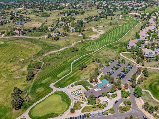 8664 S Quemoy St, Aurora, CO 80016 - aerial overview of property's location with a local golf course and nearby suburban area
