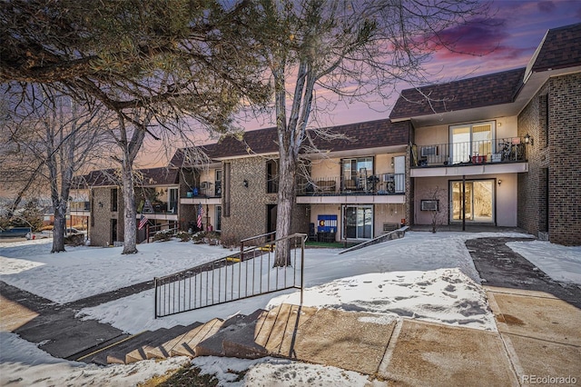 view of snow covered property