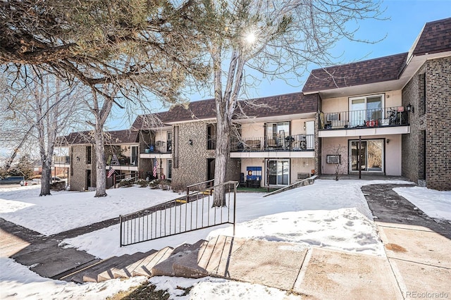 view of snow covered property