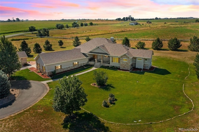 aerial view at dusk with a rural view