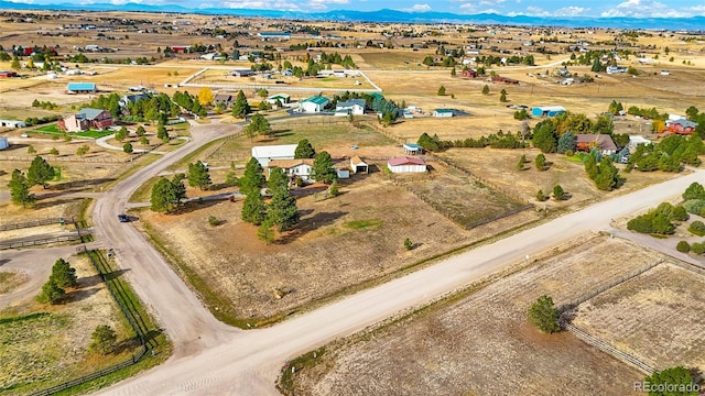 drone / aerial view featuring a mountain view