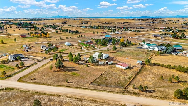 bird's eye view with a mountain view and a rural view