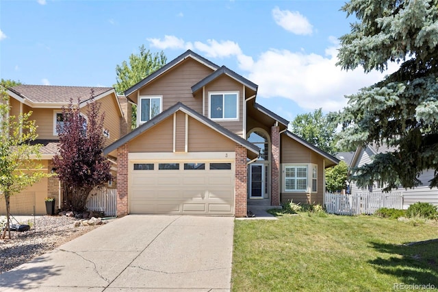 view of front property featuring a front lawn and a garage