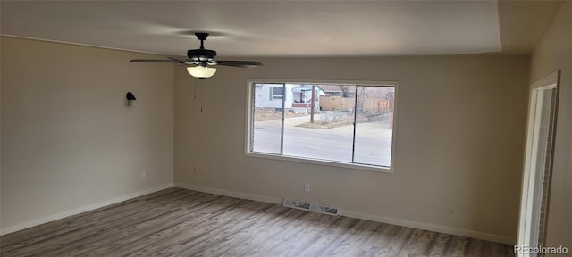 8001 Lowell Blvd, Westminster, CO 80031 - empty room with visible vents, baseboards, wood finished floors, and a ceiling fan