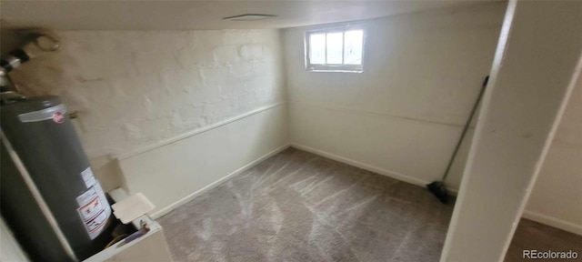 8001 Lowell Blvd, Westminster, CO 80031 - basement with carpet floors and water heater