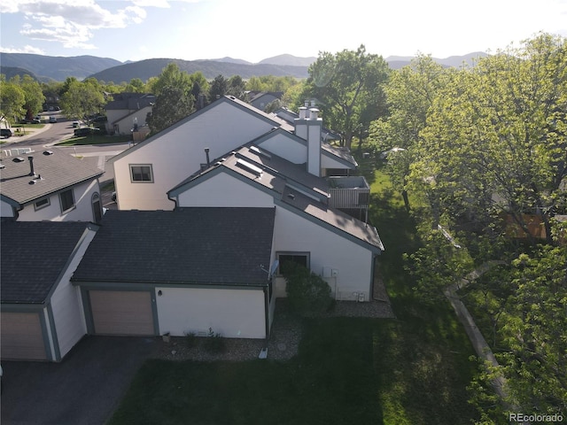 view of subject property featuring mountains