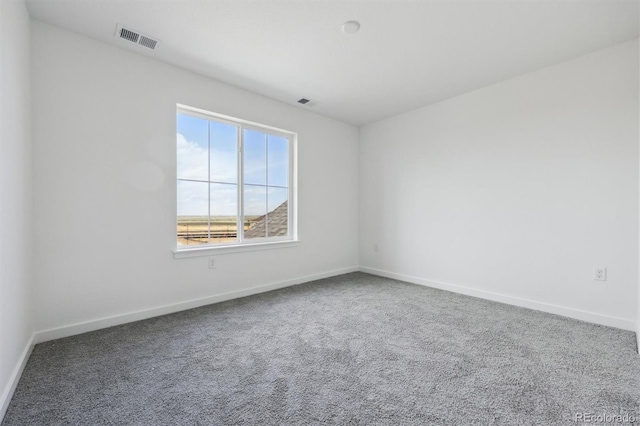 25234 E Warren Pl, Aurora, CO 80018 - empty room featuring carpet and baseboards