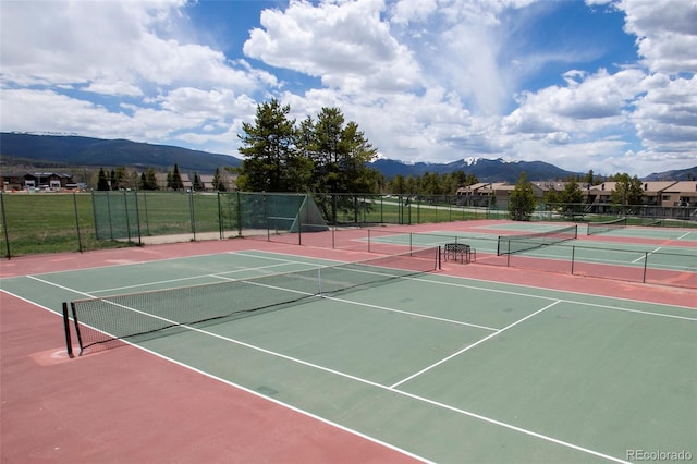 62 County Road 838 Unit 21-4, Fraser, CO 80442 - view of tennis court with community basketball court and a mountain view