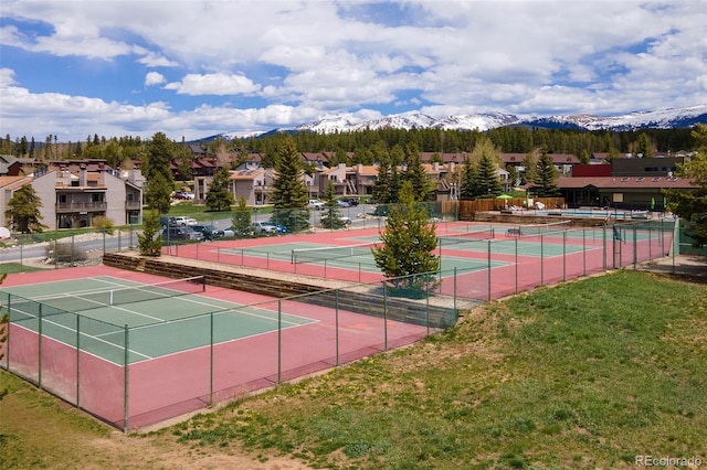 62 County Road 838 Unit 21-4, Fraser, CO 80442 - view of tennis court with a mountain view and a residential view