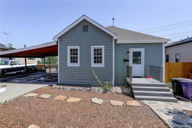 view of front facade with a carport