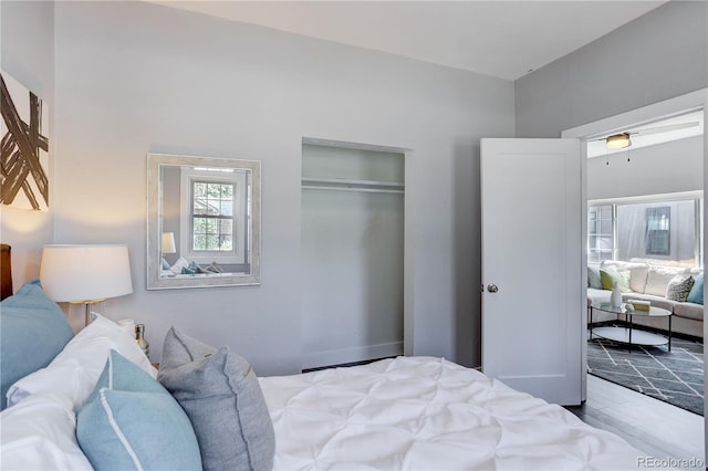 bedroom featuring a closet and light hardwood / wood-style floors