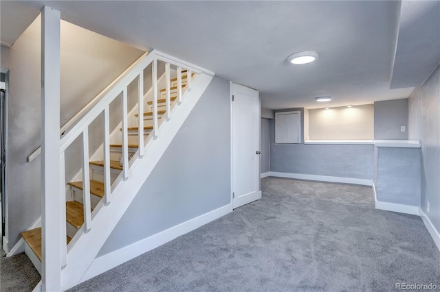 basement with carpet flooring