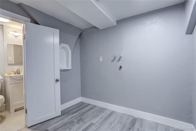 washroom featuring light hardwood / wood-style flooring