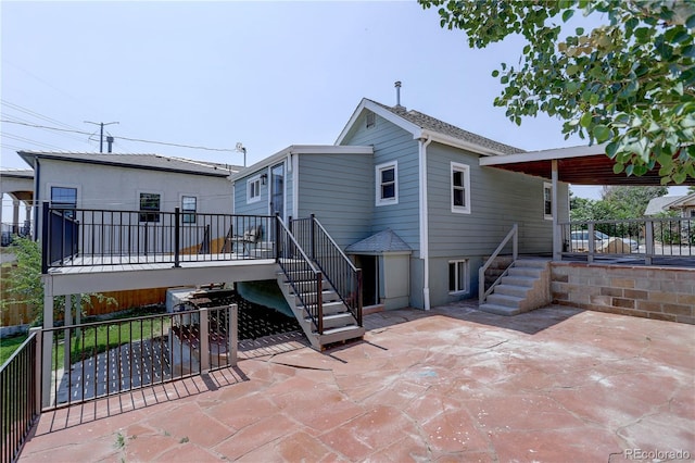 rear view of house featuring a patio area