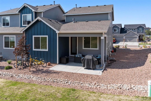 back of house with a patio